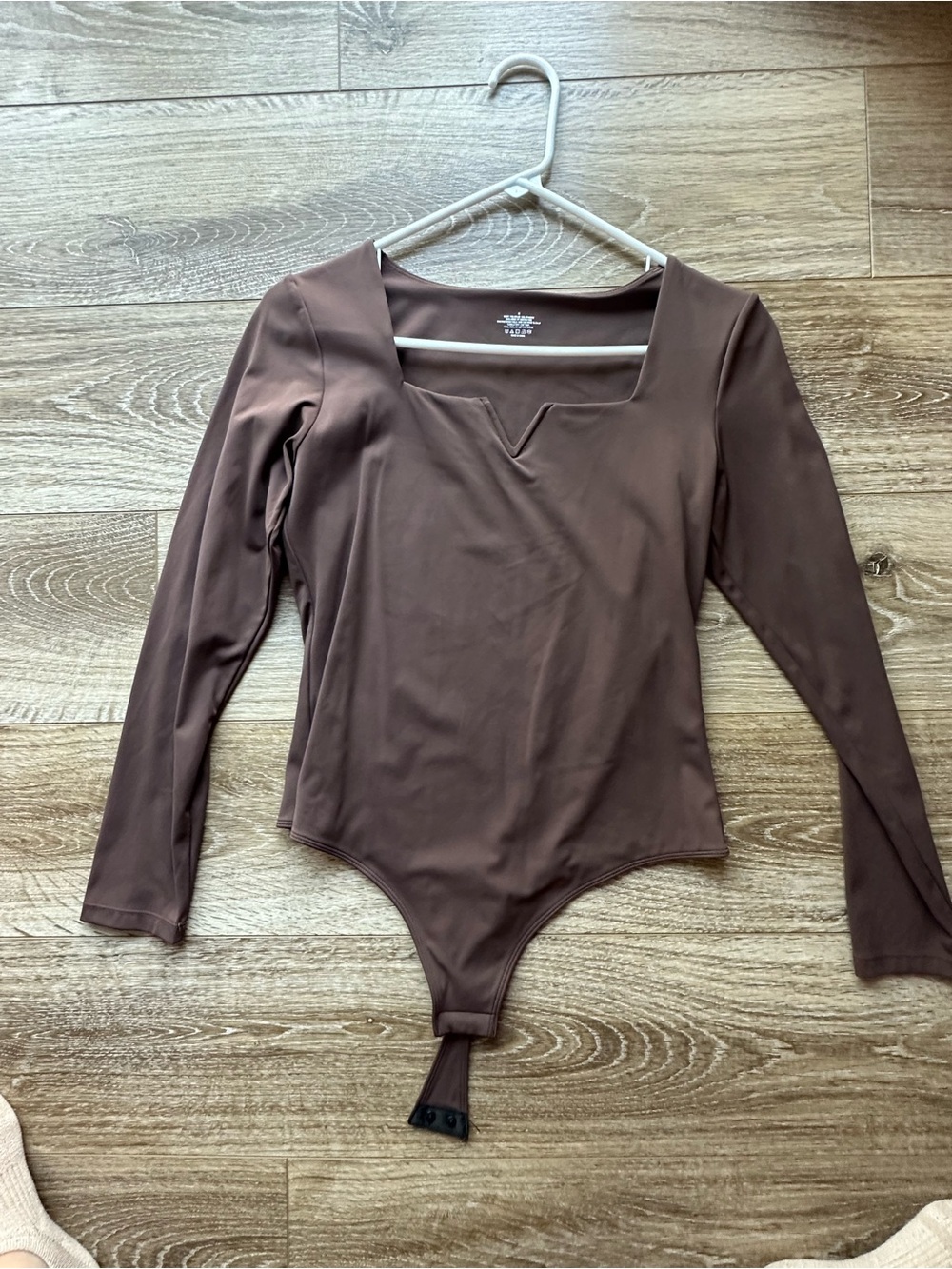 Brown long sleeve bodysuit